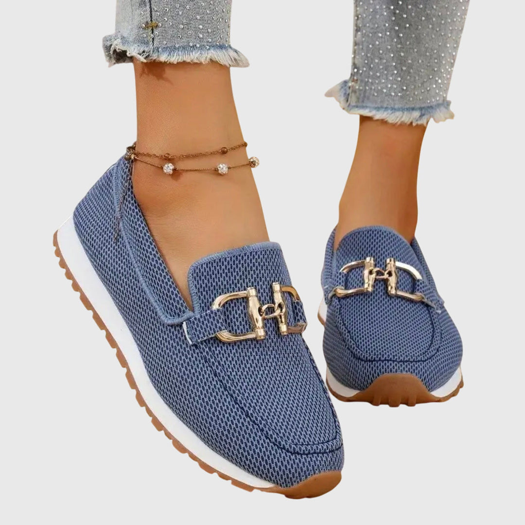 Women's blue orthopedic loafers with gold-tone horsebit, comfortable slip-on shoes offering foot support.