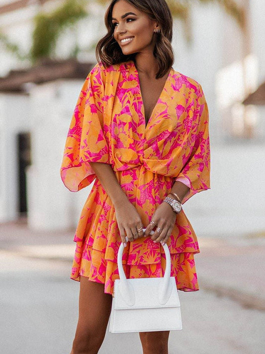 Women's bohemian chic mini dress, flowy fit, perfect for summer casual or vacation.