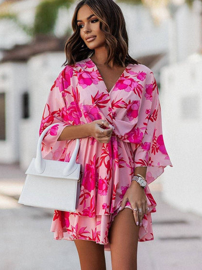 Flattering flowy bohemian mini dress for women, ideal short summer casual wear.