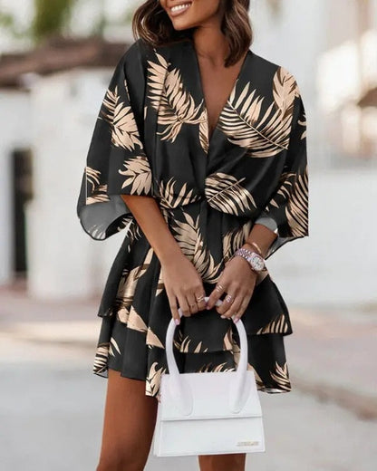 Chic & flattering women's boho mini dress, ideal flowy summer vacation wear.