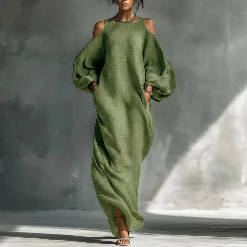 Boho chic women's long sleeve cold shoulder maxi dress, offering a comfortable, flowing relaxed fit.