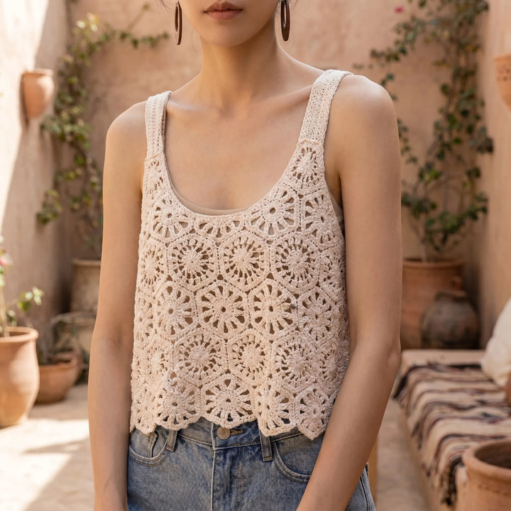 Women's Bohemian crochet sleeveless crop top with scoop neck. Ideal for summer casual wear & festivals. Relaxed fit.