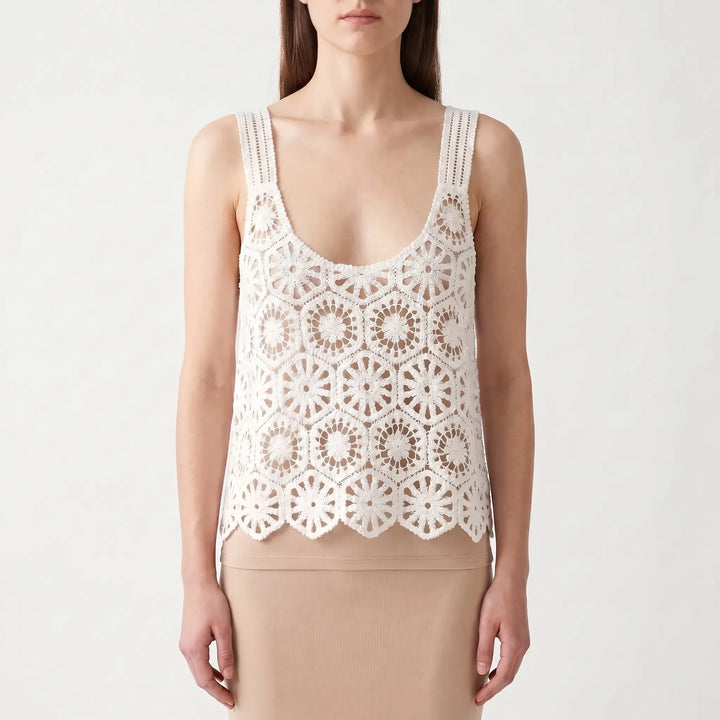 Women's relaxed fit sleeveless crochet crop top with scoop neck. Bohemian summer fashion for casual & beach wear.