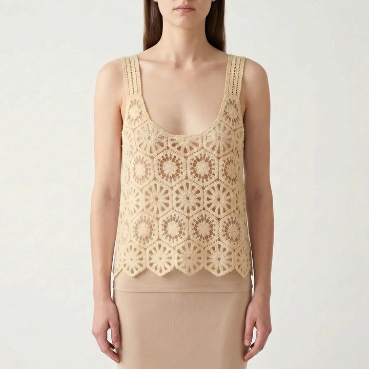 Textured bohemian crochet crop top for women, sleeveless with hollow out knit. Chic summer festival & beachwear.