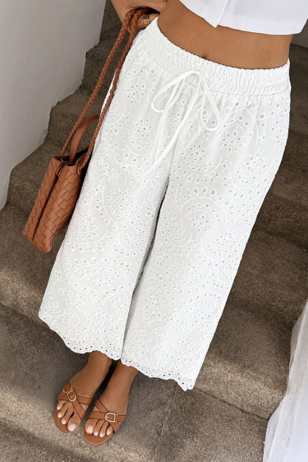 Lightweight women's bohemian cropped pants, perfect travel essentials for summer holidays and beach days.