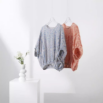 Vibrant bohemian floral print women's pullover top with comfy balloon sleeves. Relaxed & romantic for spring/summer.