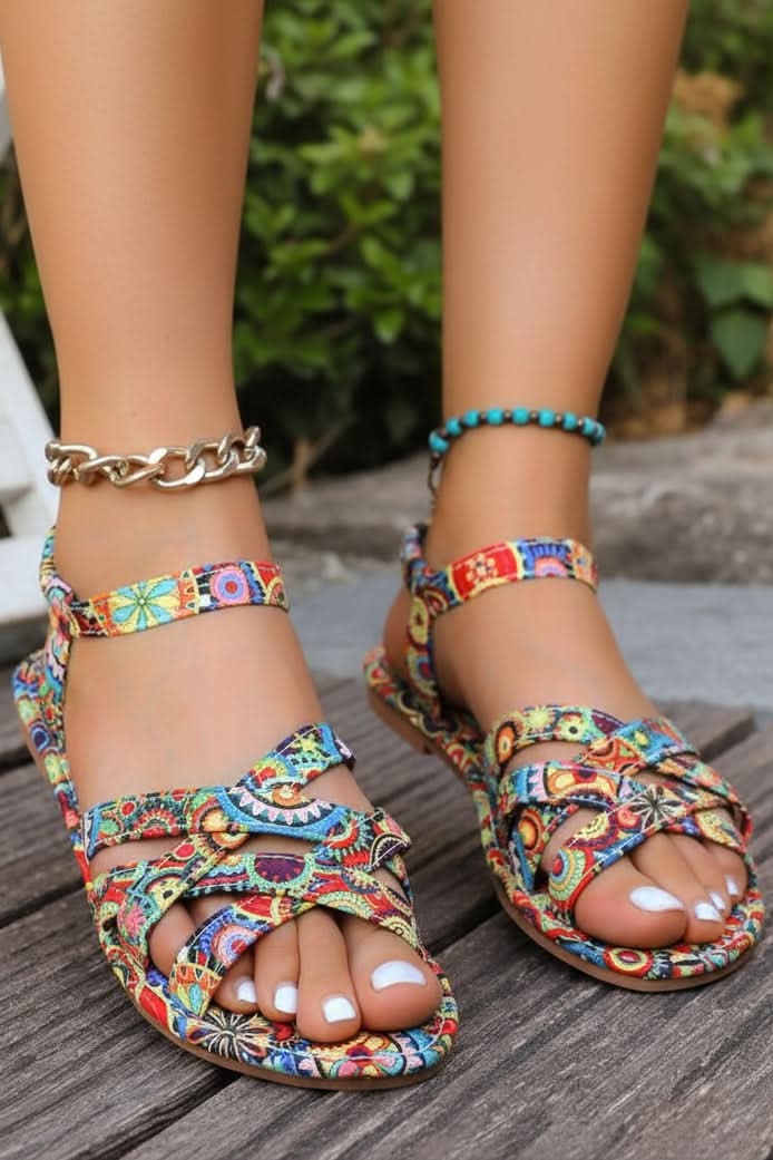 Women's Bohemian print T-strap flat sandals, perfect for summer vacations and casual wear. Comfortable beach footwear.