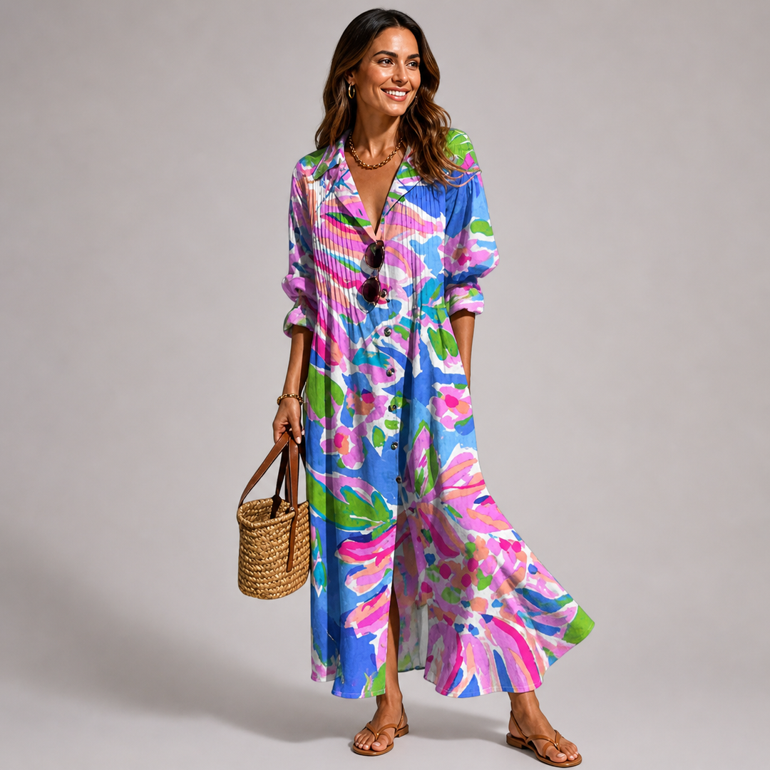 Vibrant bohemian printed maxi dress for women, button-front. Casual V-neck long sleeve summer style.