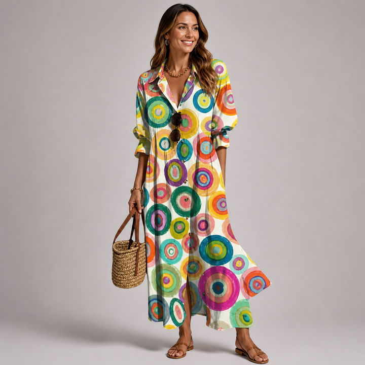 Elegant women's printed bohemian maxi dress with button-front, V-neck. Perfect long sleeve vacation outfit.