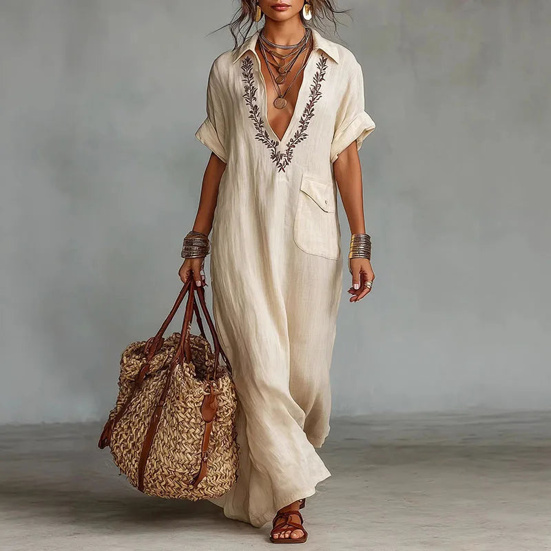 Women's bohemian printed maxi dress with deep V-neck, perfect for summer vacation or beachwear.