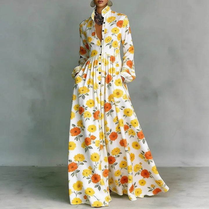 Women's printed long sleeve Bohemian maxi dress with a stand collar & button front. Effortless boho chic style.