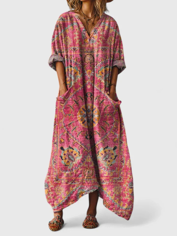 Stylish women's bohemian maxi jumpsuit with an all-over print, oversized fit, and practical pockets.