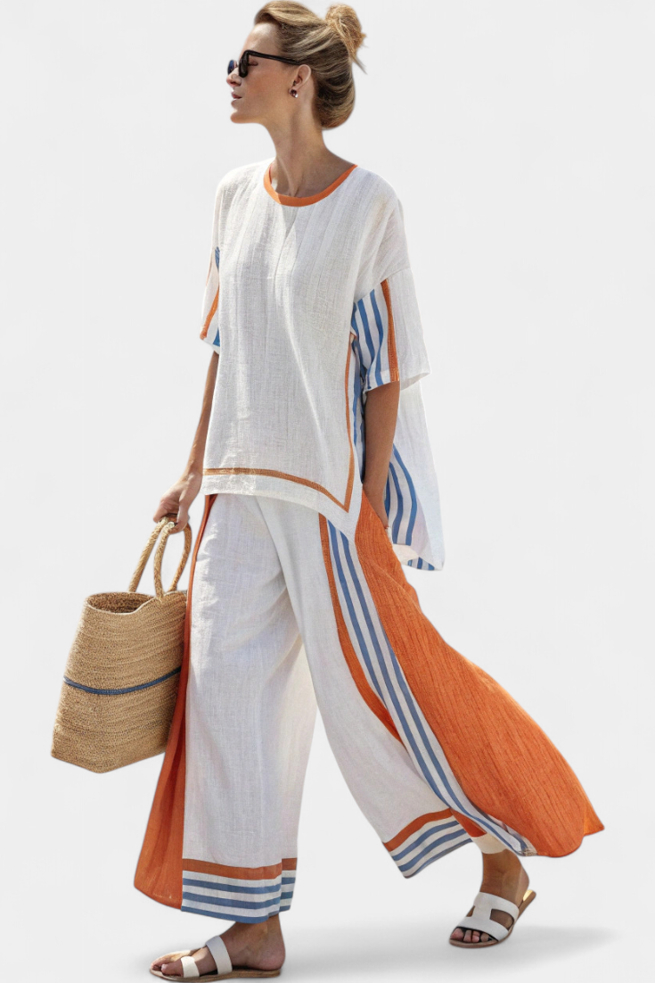 Women's bohemian striped two-piece lounge set with a relaxed tunic top & wide-leg pants. Perfect resortwear.