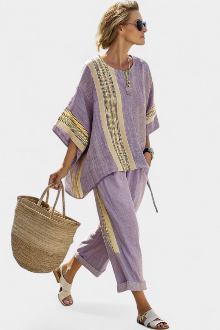 Comfortable women's striped bohemian lounge set with a loose tunic and wide-leg pants. Relaxed casual style.