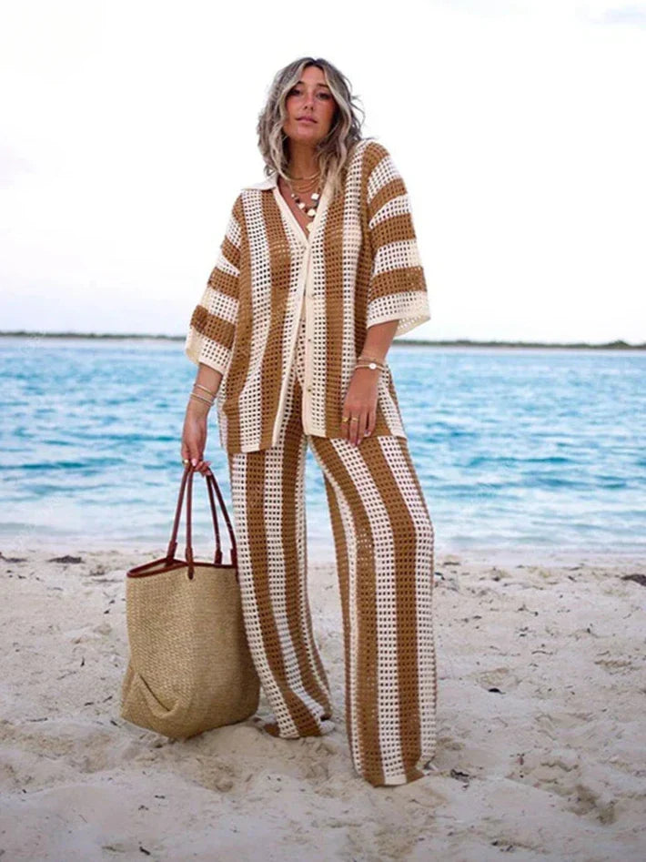 Women's bohemian striped two-piece summer set. Relaxed fit top & wide-leg pants, perfect for beachwear or vacation.