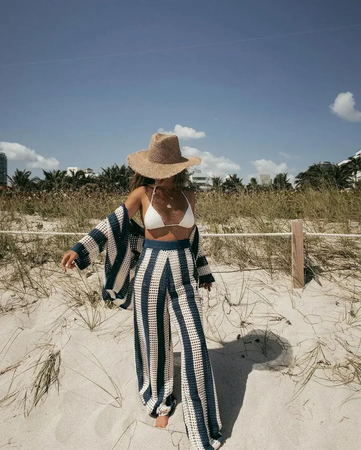 Stylish women's striped two-piece summer outfit. Boho chic design, perfect for casual wear, spring, or beach.