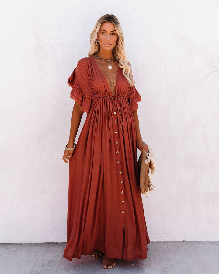 Flowing V-neck boho beach dress for women, a comfortable and chic cover up, perfect for resort or poolside style.