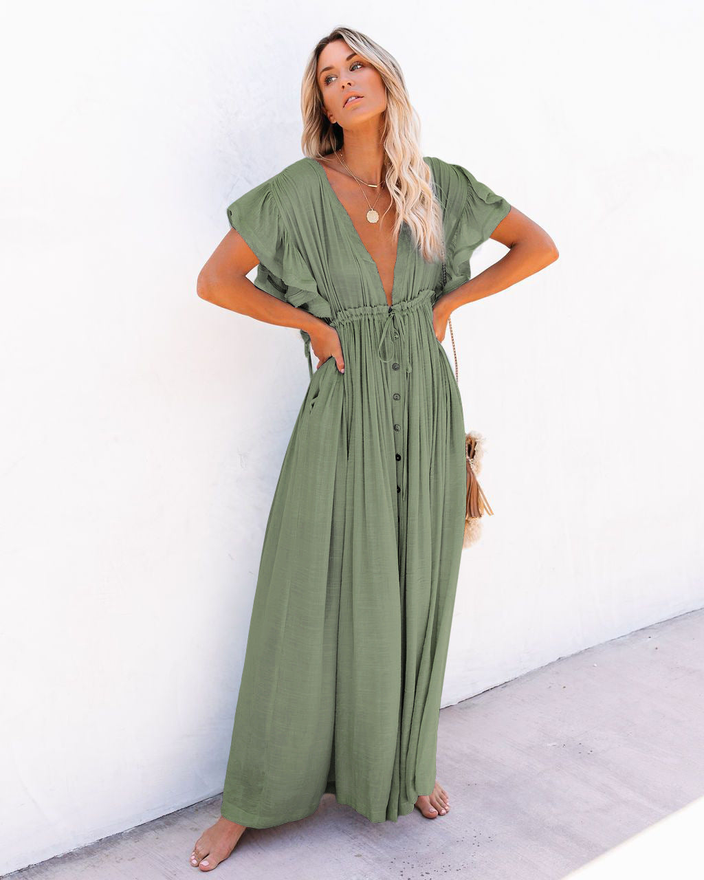 Elegant women's boho V-neck vacation dress, a lightweight beach cover up, perfect for sunny days and resort trips.