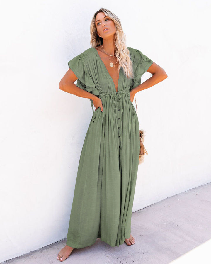 Elegant women's boho V-neck vacation dress, a lightweight beach cover up, perfect for sunny days and resort trips.