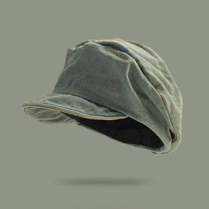 Stylish denim beret for women, featuring a boho-chic design. Perfect retro-style casual hat accessory.