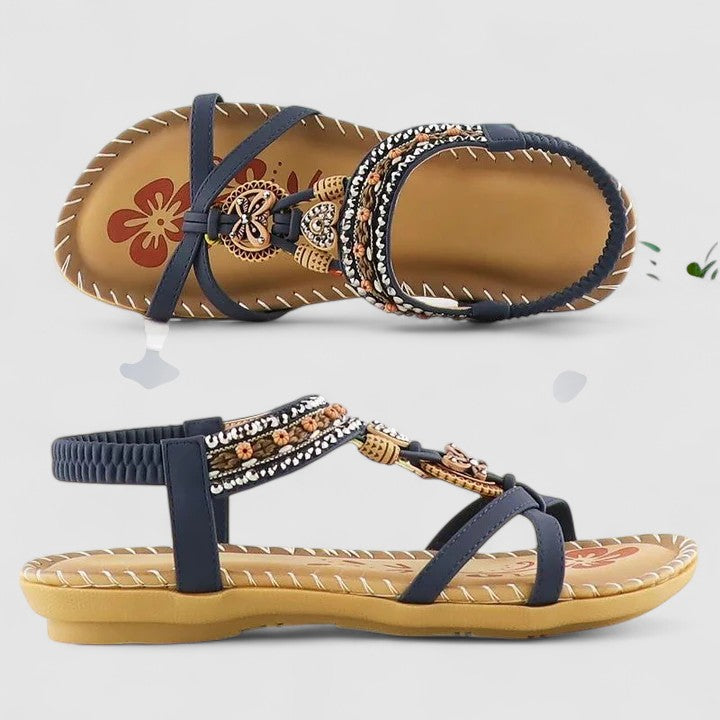Casual women's boho flat sandals with vibrant embroidery for summer and beach days.