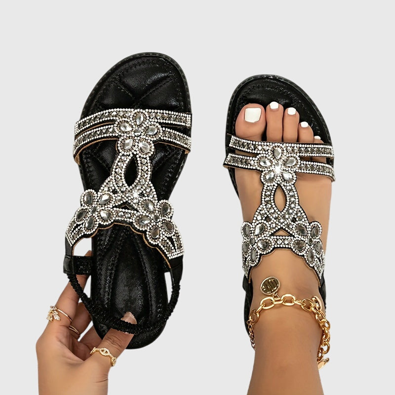 Vacation sandals for women: boho flat design with sparkling rhinestone embellishments.