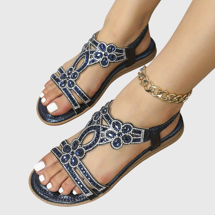 Flat summer sandals for women, embellished with rhinestones, perfect for boho vacation.