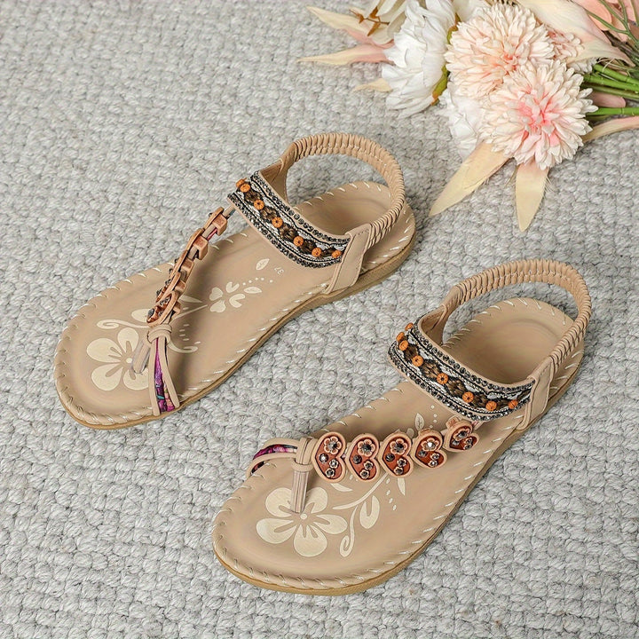 Boho rhinestone and beaded flat sandals for women, designed with a toe ring for a secure, fashionable fit.