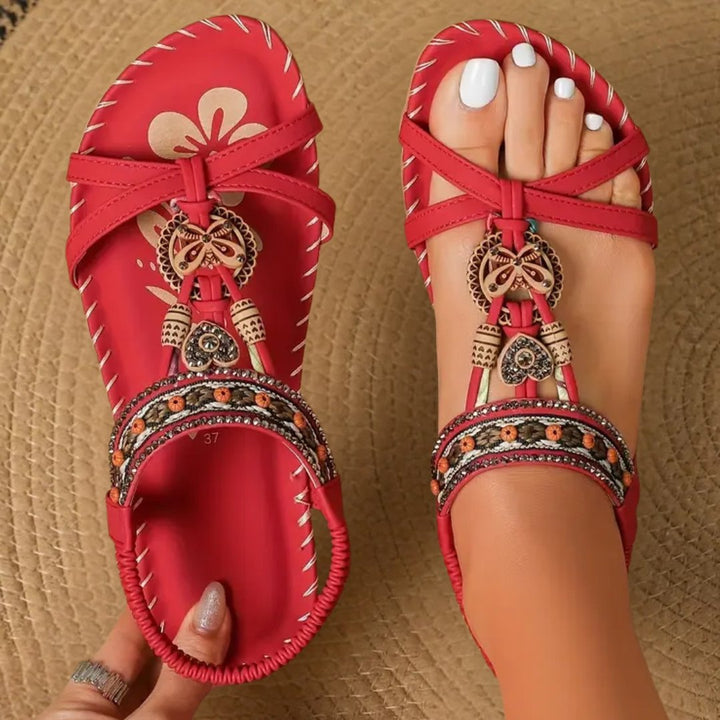 Boho flat T-strap sandals for women, offering orthopedic support & comfortable casual summer wear.