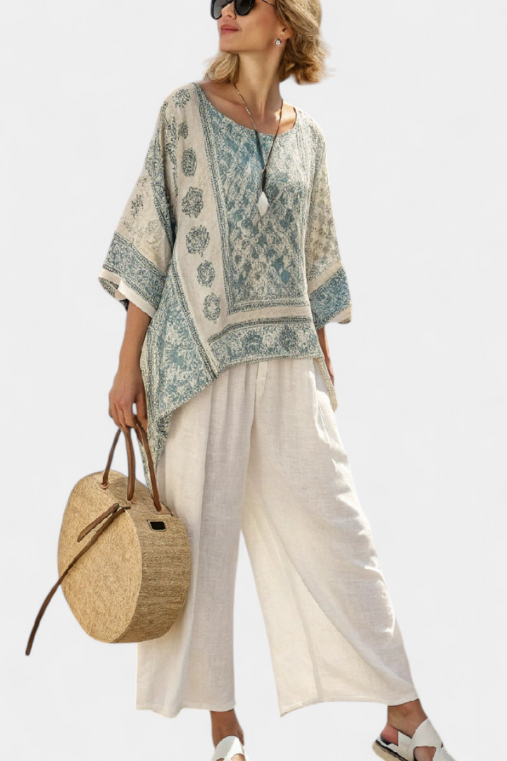 Women's boho floral block print two-piece set with batwing blouse & wide leg pants. Perfect for summer casual.