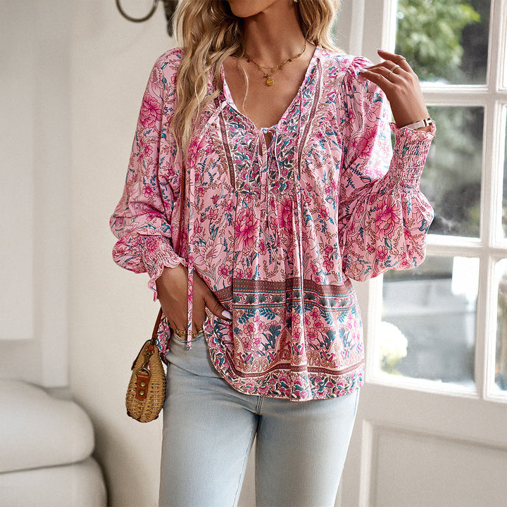 Women's boho floral loose blouse with puff sleeves & V-neck, perfect for casual spring & summer style.