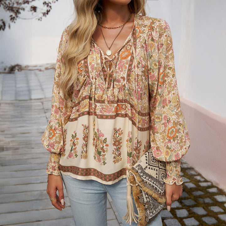 Casual chic women's loose blouse: boho floral print, V-neck, puff sleeves. A versatile summer & spring top.