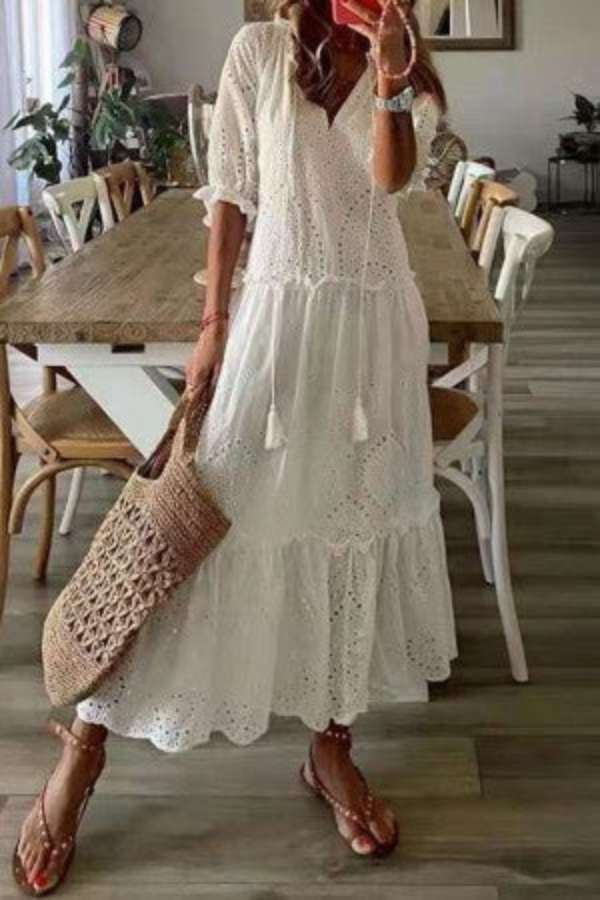 Flowy bohemian women's floral maxi dress, ideal for summer festivals, vacations, and casual chic wear.