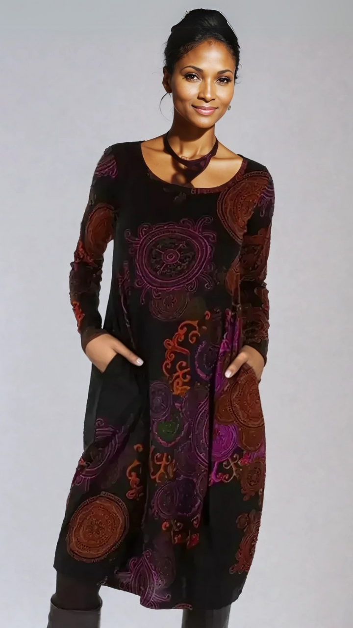 Comfortable bohemian floral midi dress for women, with charming long sleeves & elegant design.
