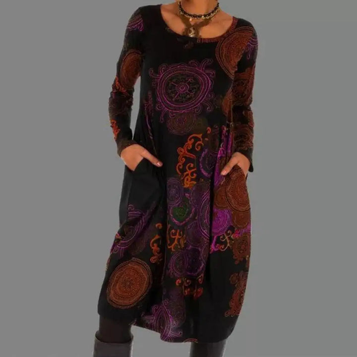 Vibrant floral print on a women's boho midi dress with long sleeves, offering versatile elegant style.