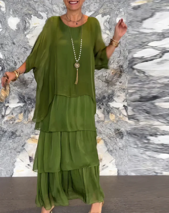 Stylish women's two-piece bohemian maxi dress outfit, ideal for elegant casual summer wear.