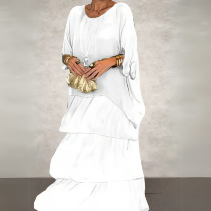 Flowy women's maxi dress set, a versatile two-piece boho outfit for casual or vacation wear.