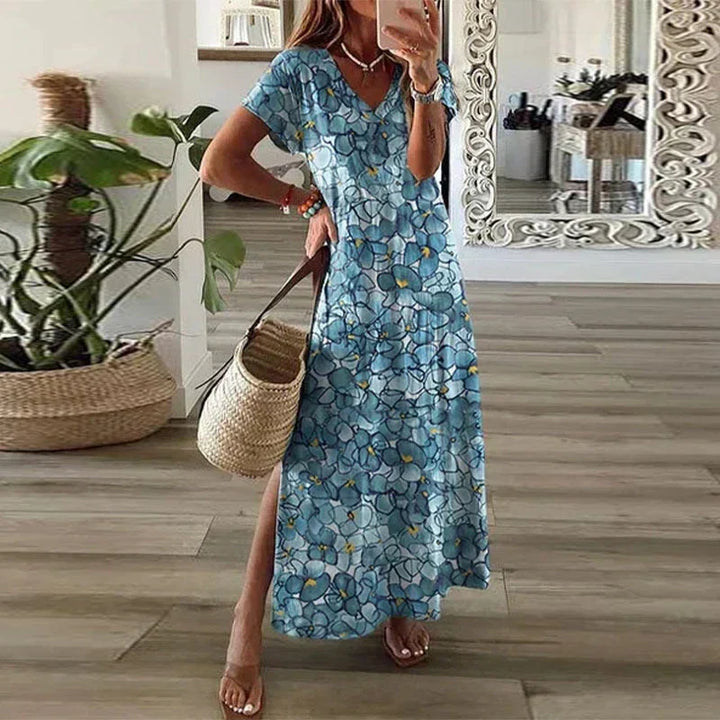 Elegant women's bohemian maxi dress, short sleeve v-neck with unique paisley print, offering comfort & style.