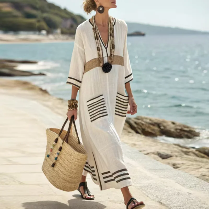 Striped V-neck women's maxi dress in a boho style, versatile for beach, summer, or casual resort wear.