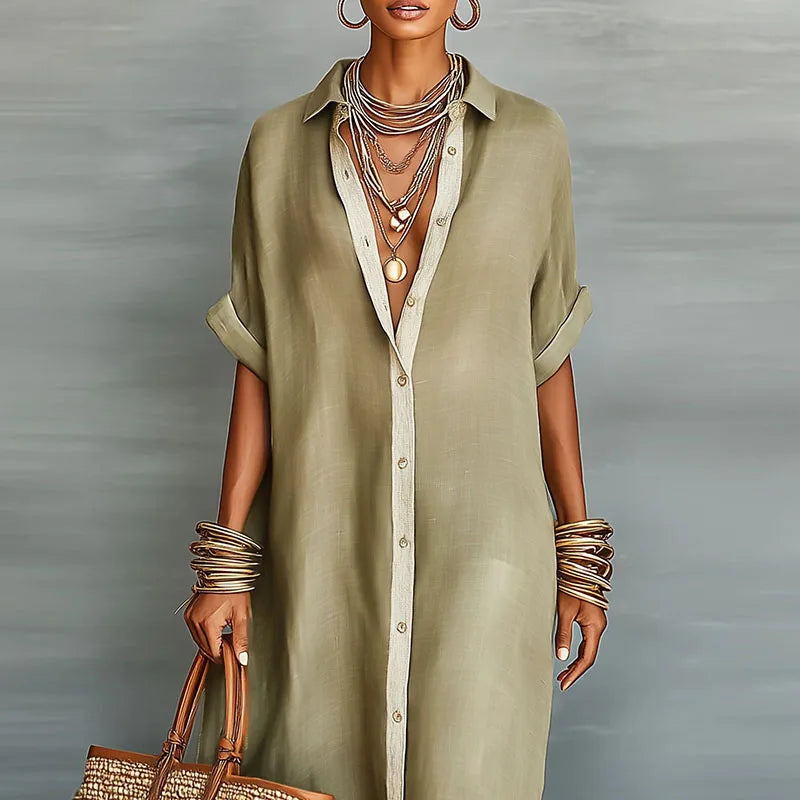 Flowing women's boho maxi dress, elegant contrast print & comfortable short sleeves for stylish summer wear.