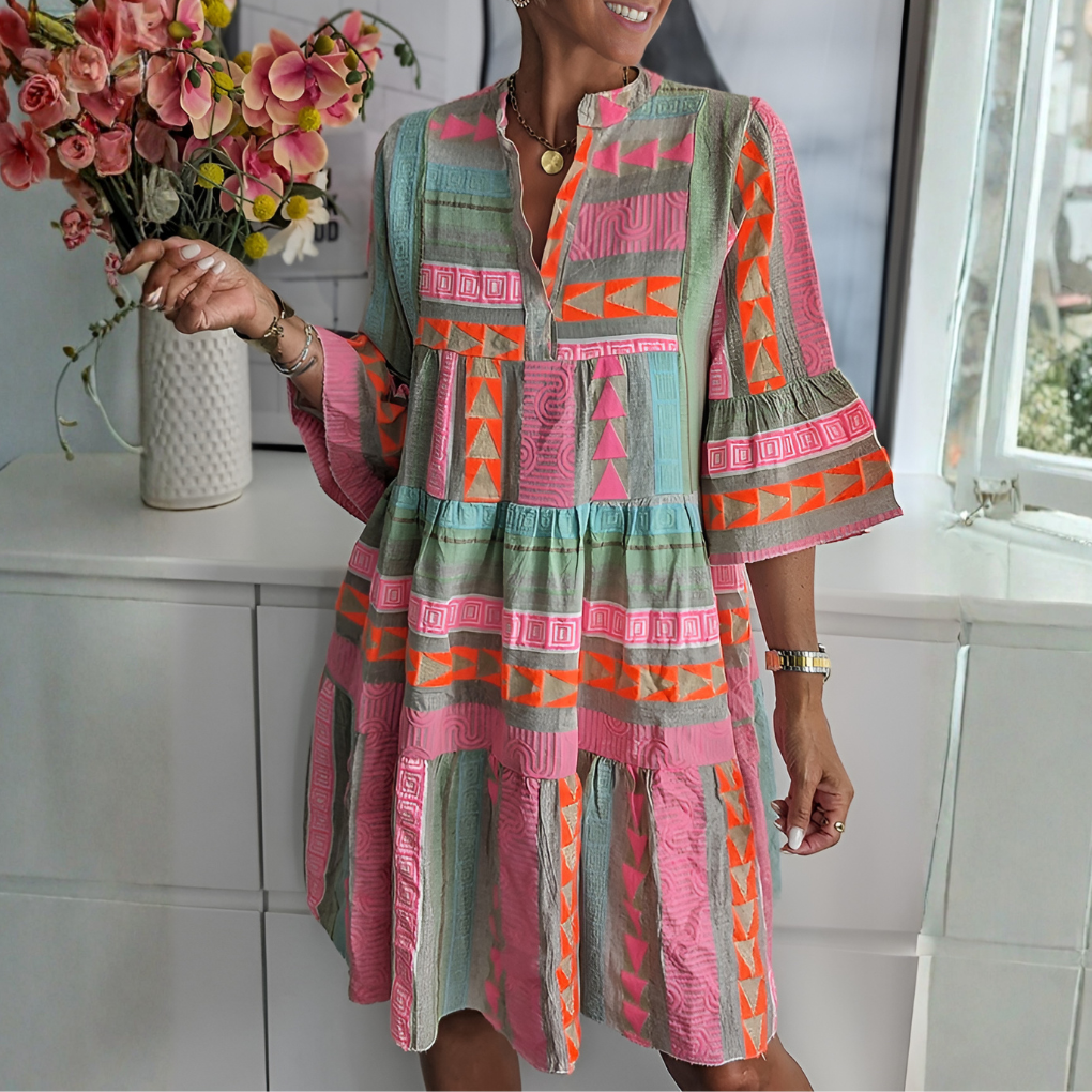 Women's boho midi dress with geometric print, V-neck & three-quarter sleeves. Loose, comfortable, summer style.