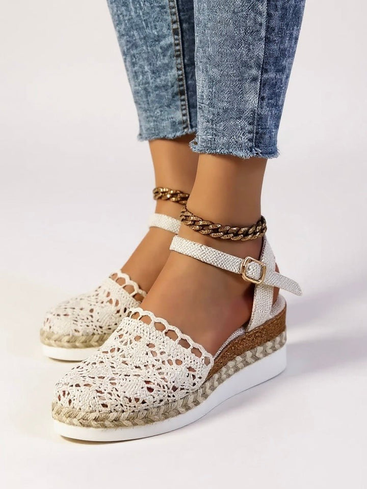 Elegant women's espadrille platform sandals. Bohemian style with a comfortable ankle strap, perfect for summer.
