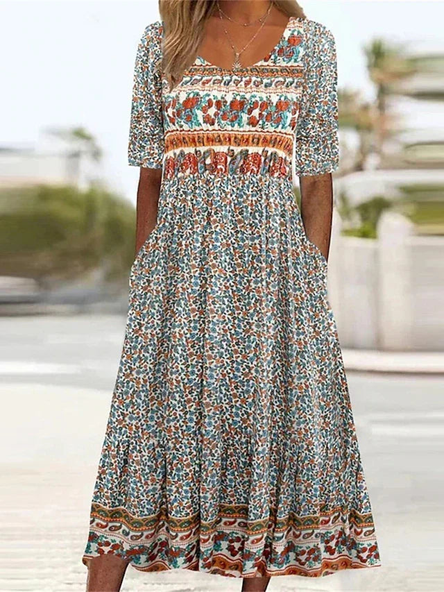 Women's boho print midi dress with short sleeves, round neck, and convenient side pockets, perfect for summer casual style.