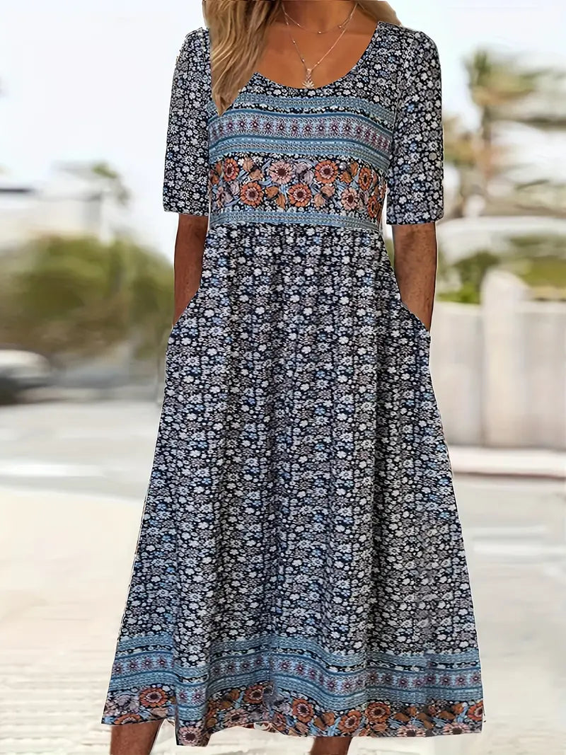 Flowy women's bohemian print midi dress, featuring a vibrant boho pattern and practical side pockets for a chic summer look.