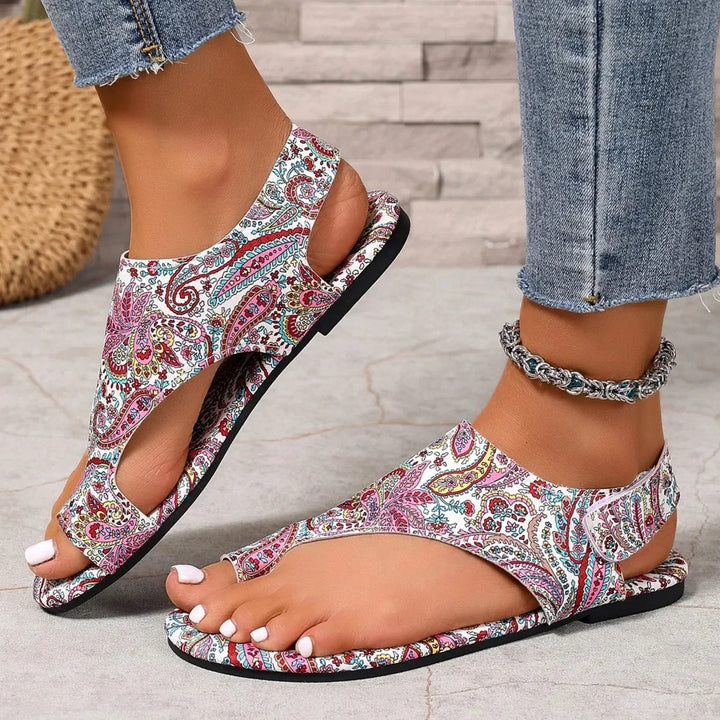 Vibrant mosaic print slingback flats for women. Boho open-toe design with ultimate cushioned comfort.