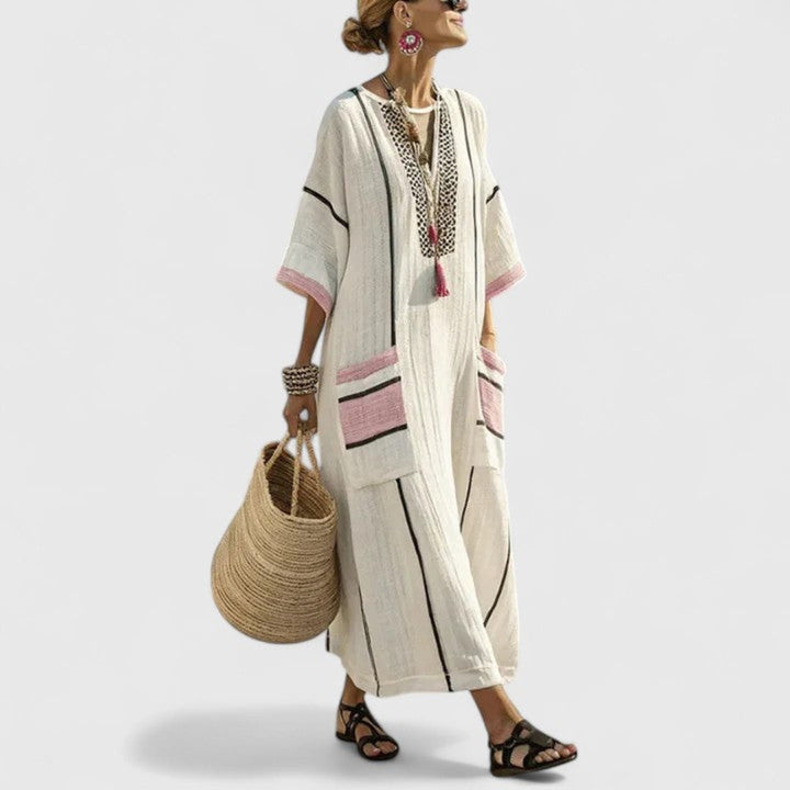 Comfortable striped bohemian V-neck maxi dress with handy pockets, a loose kaftan style for women's summer fashion.