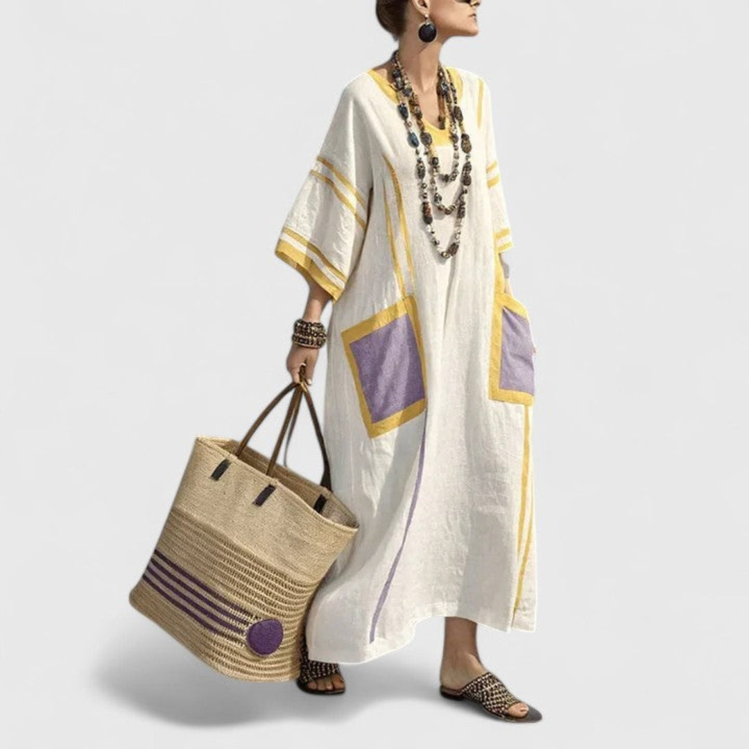 Elegant women's striped maxi dress, V-neck, loose fitting kaftan style with pockets, perfect summer beach wear.