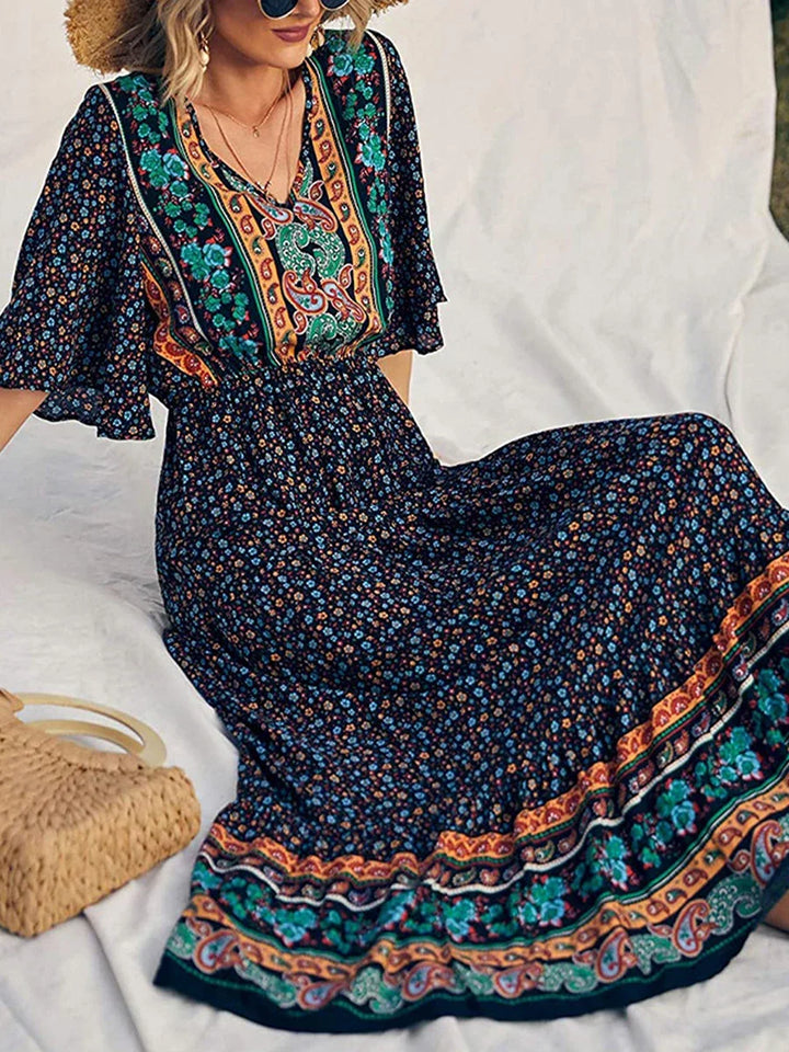 Women's V-neck short sleeve boho print dress, ideal for summer vacation and beach fashion.