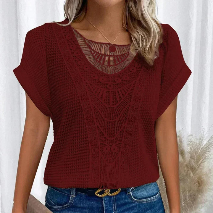 Comfortable women's relaxed fit boho top, short sleeve, featuring elegant crochet detailing.