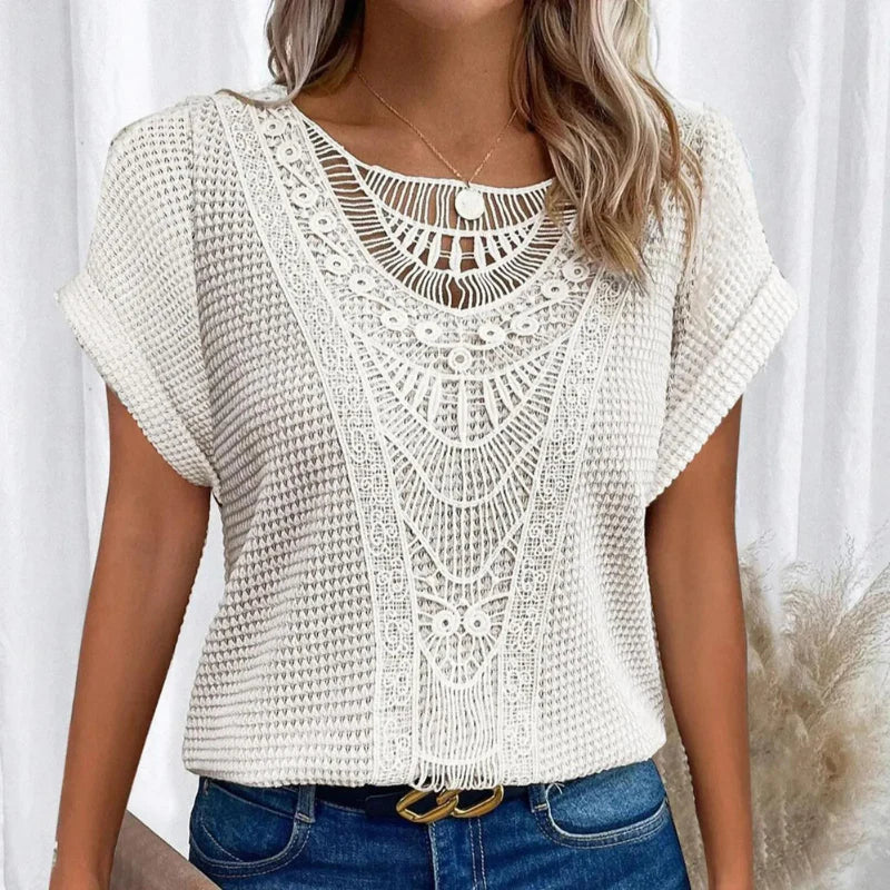 Women's stylish boho top with crochet details, perfect for a casual spring or summer outing.